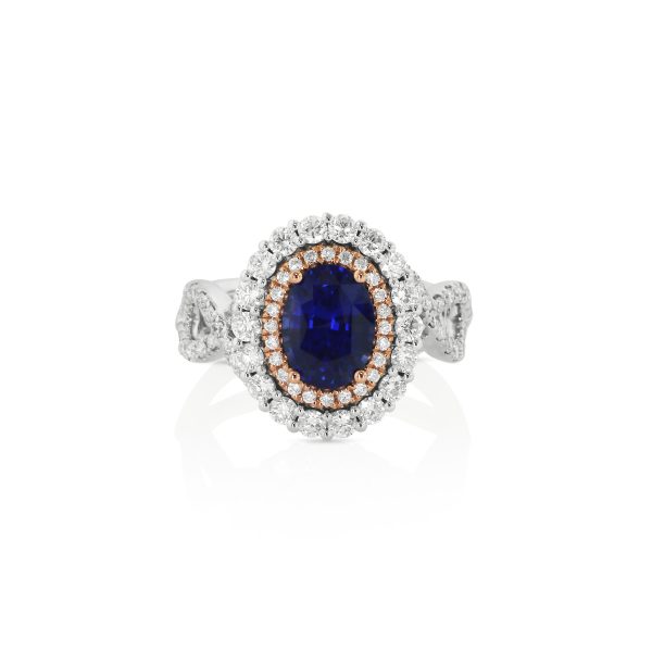 Oval Blue Sapphire and Diamond Halo Ring