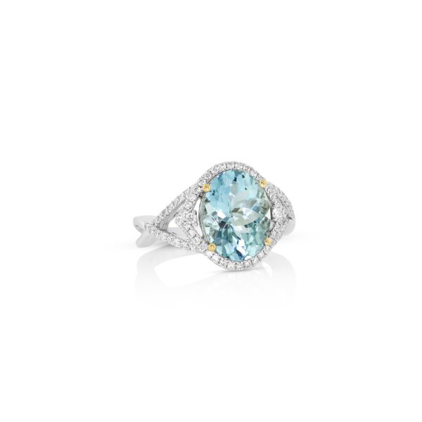 Aquamarine and Diamond Twist Halo Ring